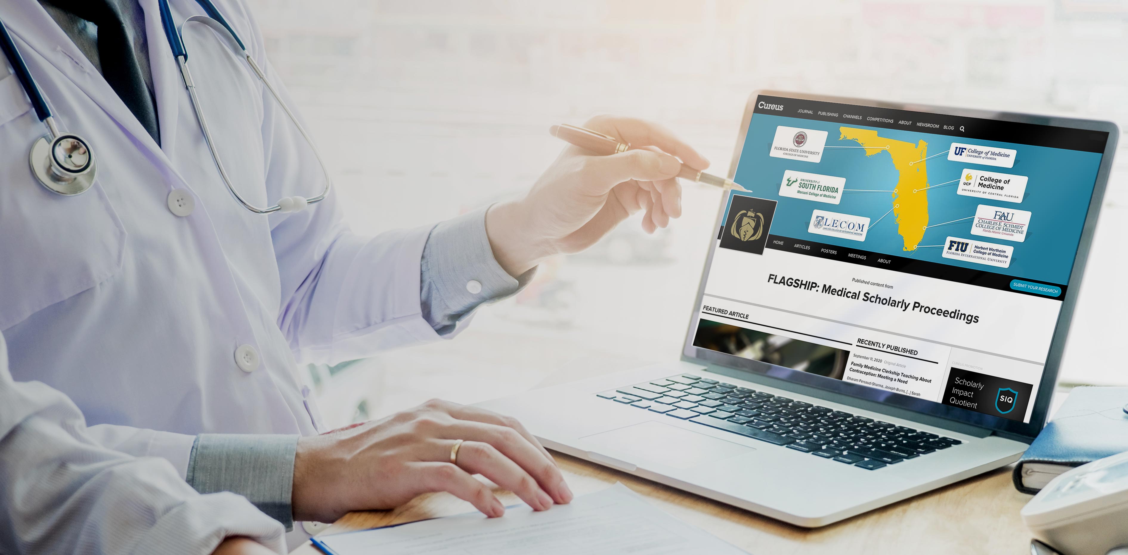 A medical practitioner holding a pen uses a laptop to view and edit channel information on Cureus.com